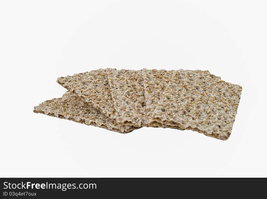 Seasame seed, rye crispbread isolated on white. Clipping path. Seasame seed, rye crispbread isolated on white. Clipping path