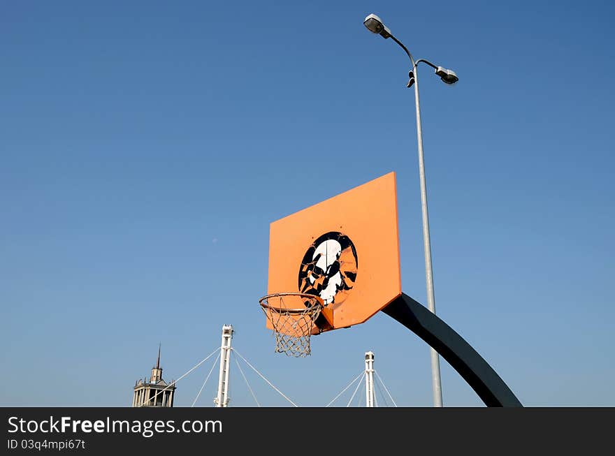 Orange basketball backboard and sky