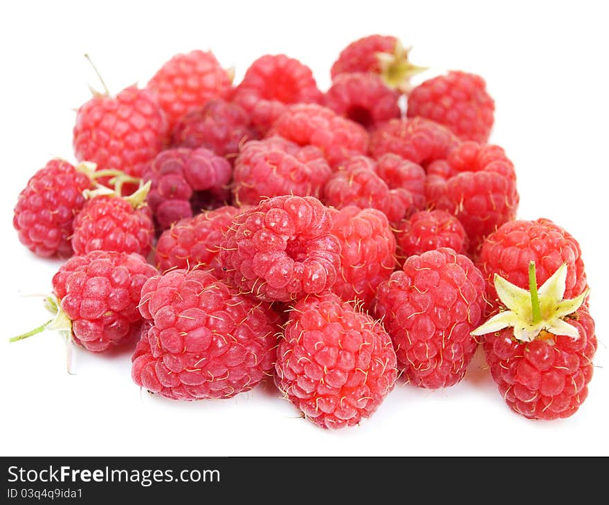 Fresh summer raspberries on a white background