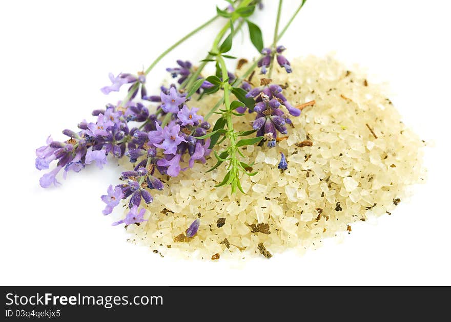 Herbal sea salt and lavender on a white background