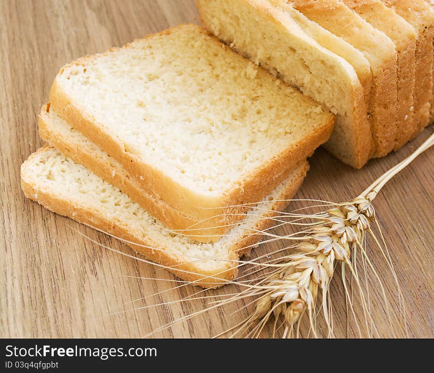 White bread and wheat on the table