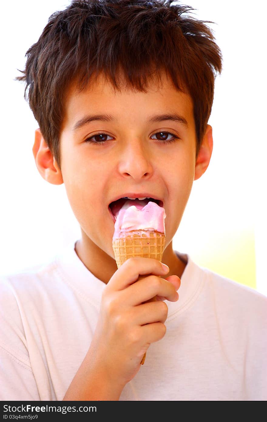 A boy enjoying his ice-cream closeup portrait shot