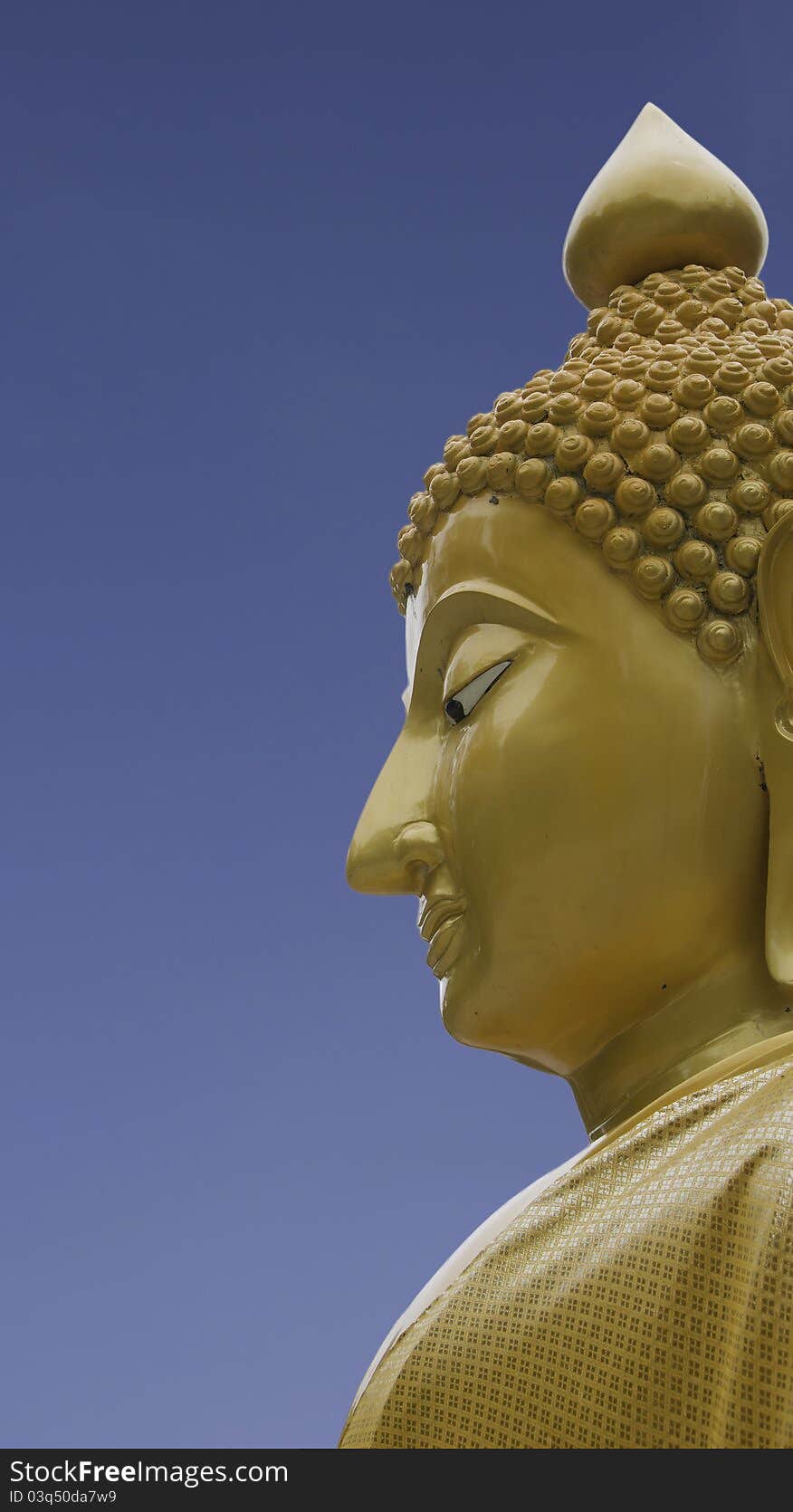 Side face buddha statue