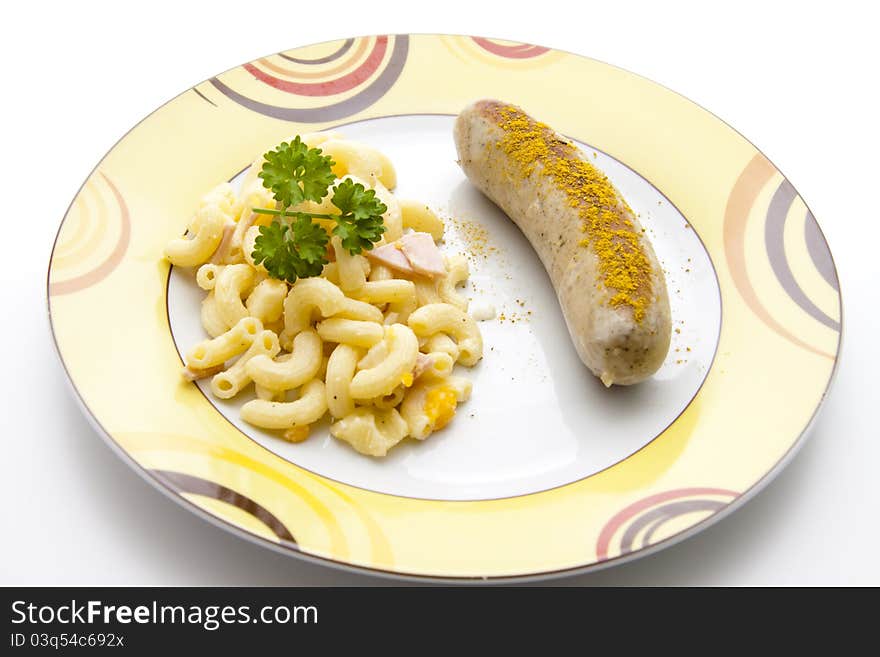 Noodle salad with curry fried sausage