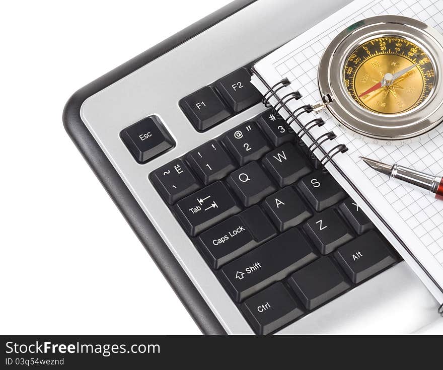 Computer keyboard and pen on white background