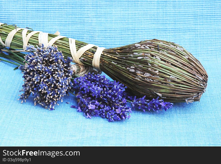 Dry levender flowers on blue background. Dry levender flowers on blue background