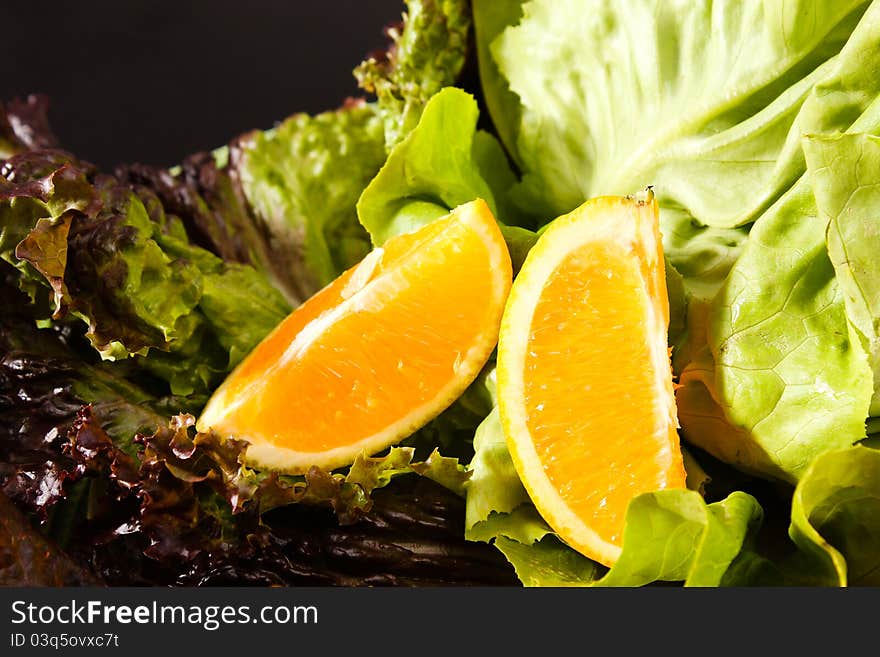 Composition of fruits and vegetables lettuce and orange