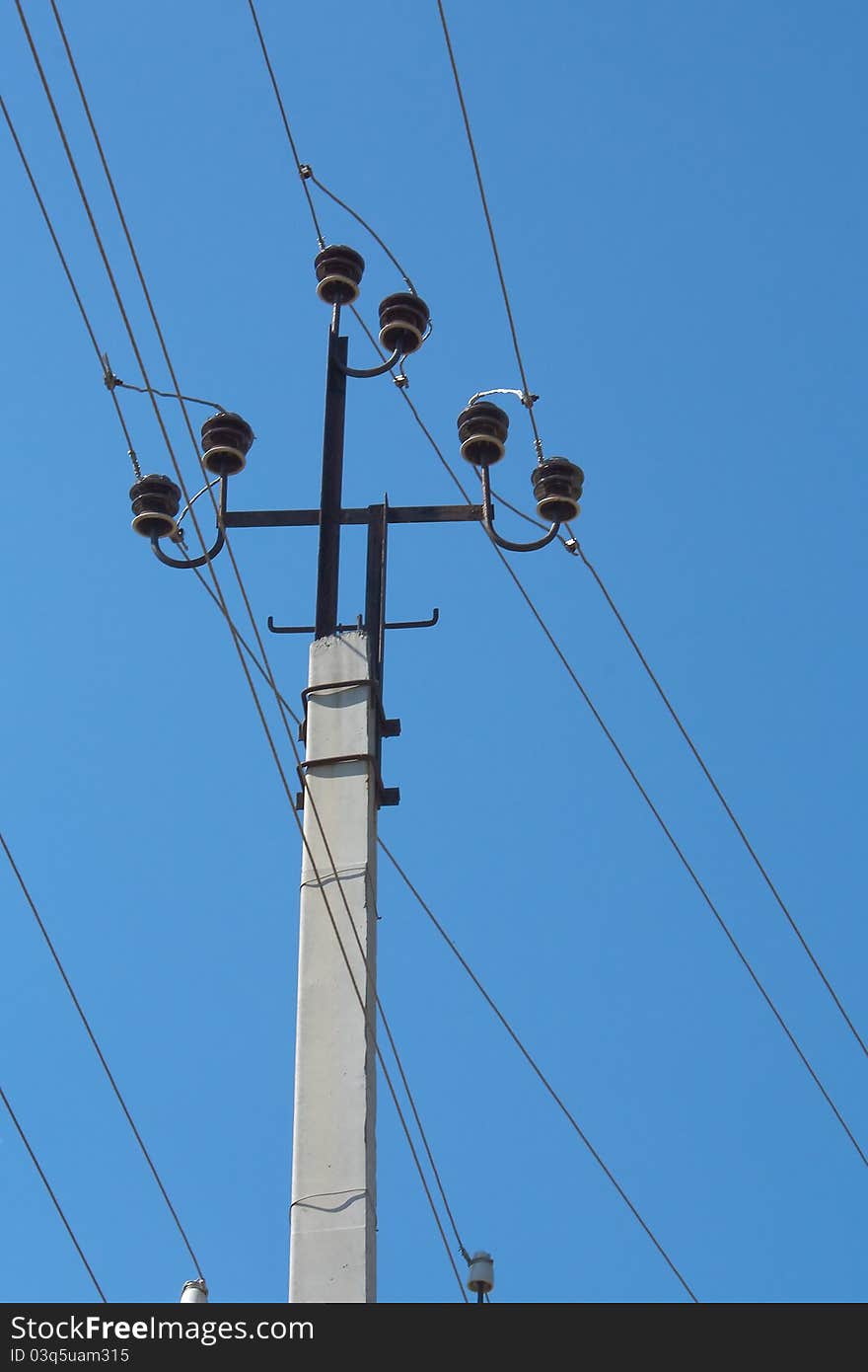 Electric pole with wires on a sky background. Electric pole with wires on a sky background