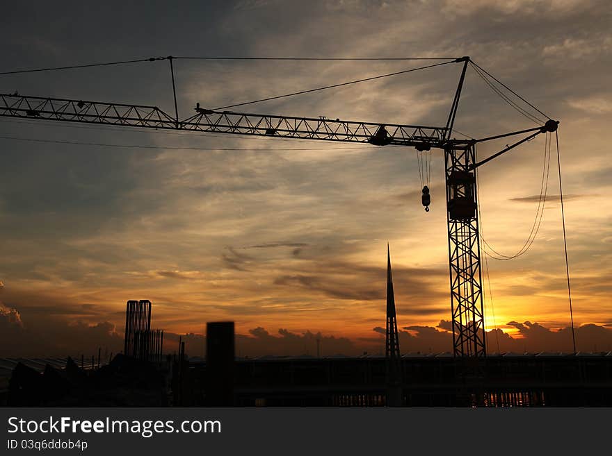 Construction crane with sunset in thailand