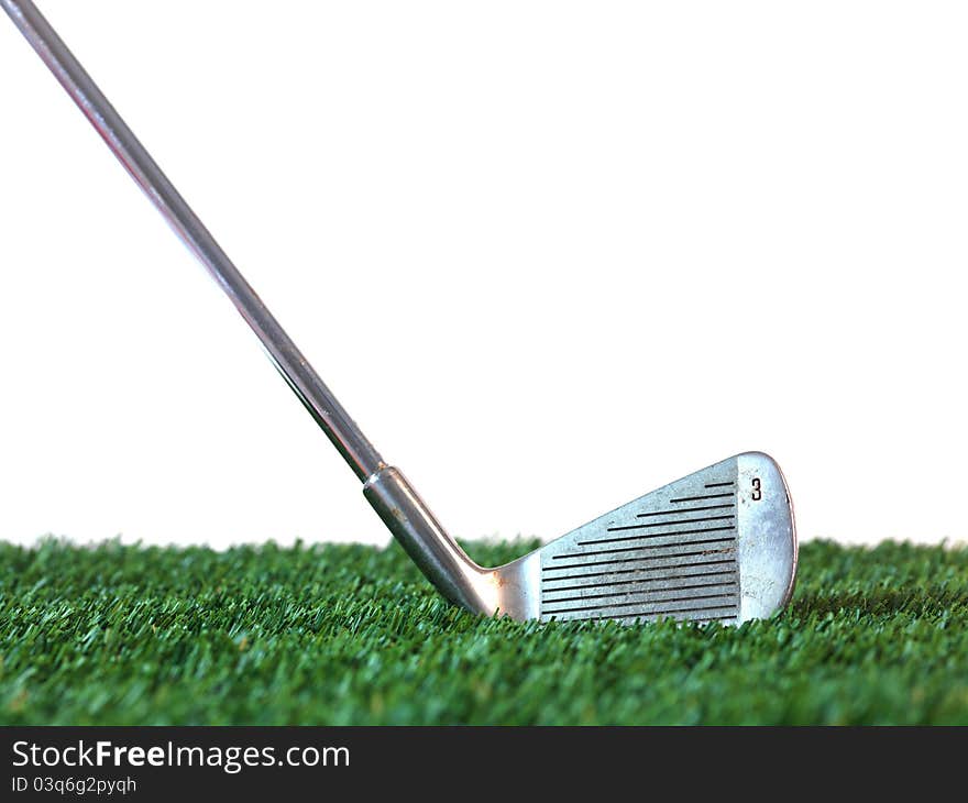 Golfing equipment on artficial grass outdoors