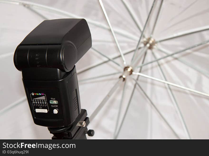 Black studio flash with white octagonal soft box