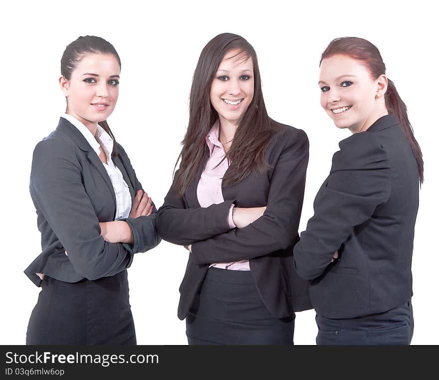 Three young businesswomen isolated over white. Modern, fresh and candid. Three young businesswomen isolated over white. Modern, fresh and candid.