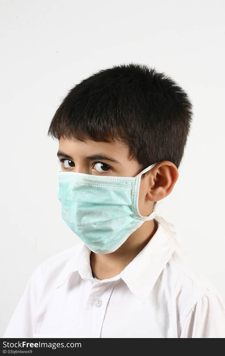 Flu illness child boy in medicine healthcare mask. Flu illness child boy in medicine healthcare mask