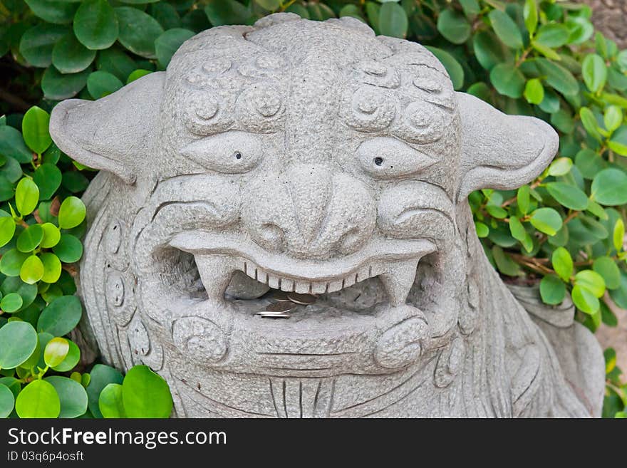 Stone carving sculpture - the symbol of Power. Stone carving sculpture - the symbol of Power