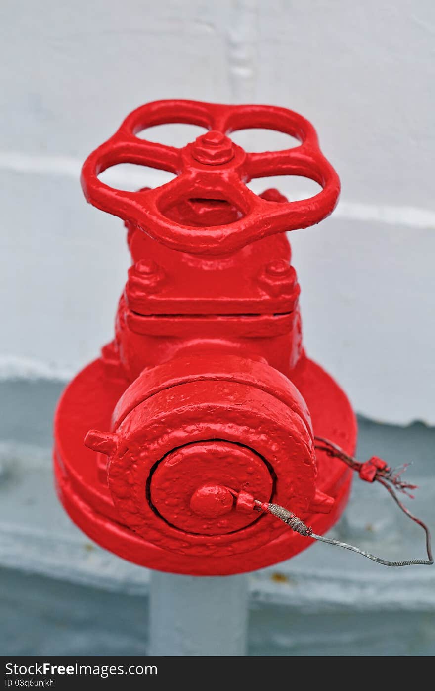 Red fire hydrant on the sailing deck. Red fire hydrant on the sailing deck