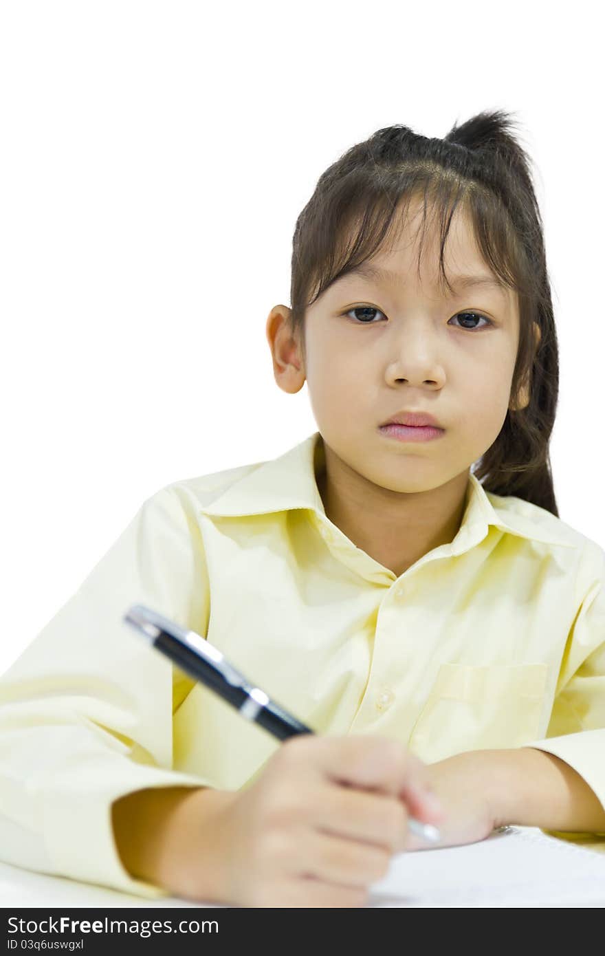 Portrait of a young business woman with pen on white background