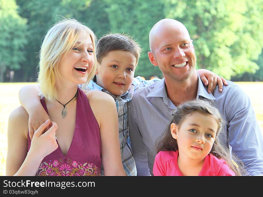 Group portrait of the big and happy family on walk in park. Group portrait of the big and happy family on walk in park