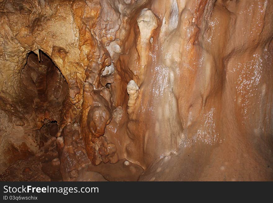 Details on the cave wall of a gallery lighted. Details on the cave wall of a gallery lighted