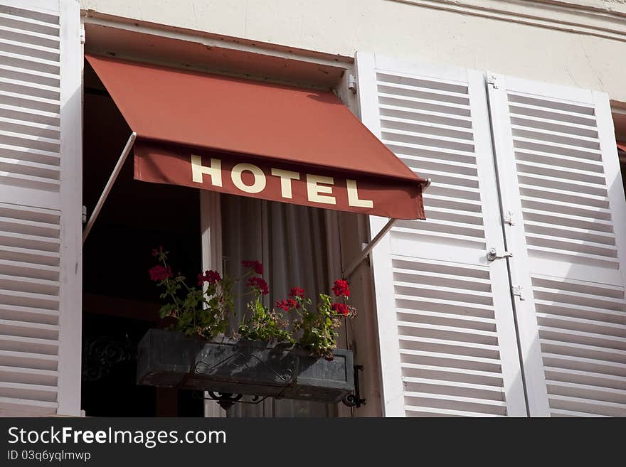 Hotel Sign over Window in Paris, France