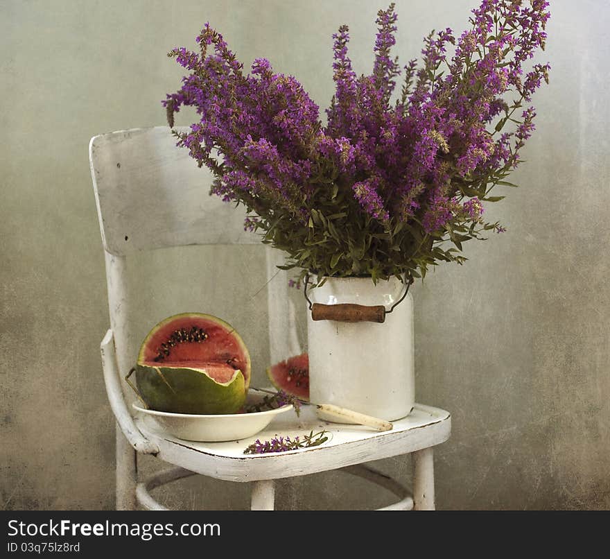 Still life with a violet flowers