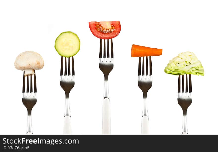 Vegetables on the collection of forks, diet and healthy eating concept. Vegetables on the collection of forks, diet and healthy eating concept