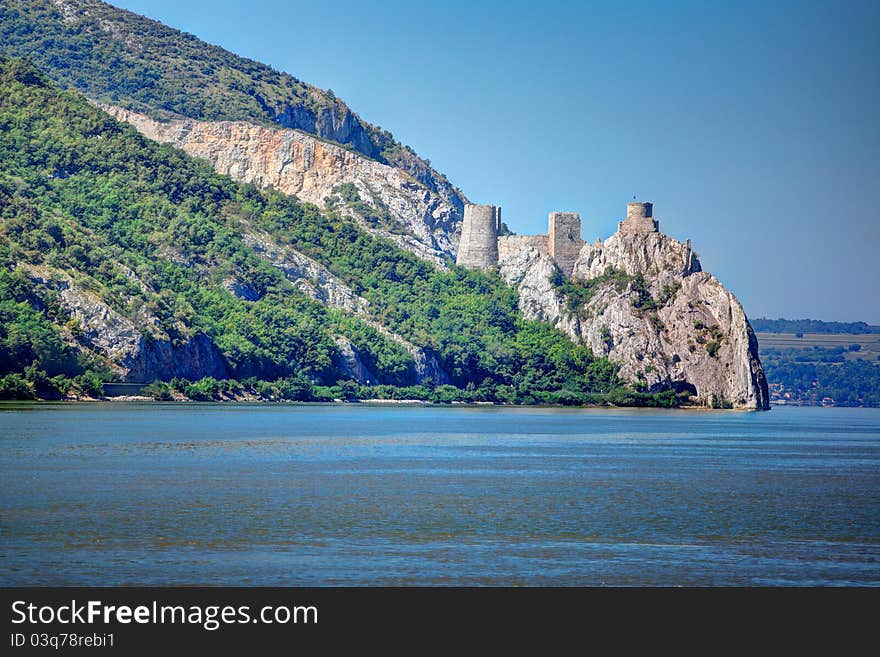 Golubac fortress in Serbia seen from the Romanian side of Danube river.