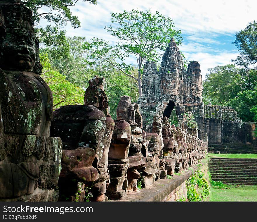 The Eastern Gate of Angkor and the entrance to Angkor Thom, with a row of statues from Hindu mythology.