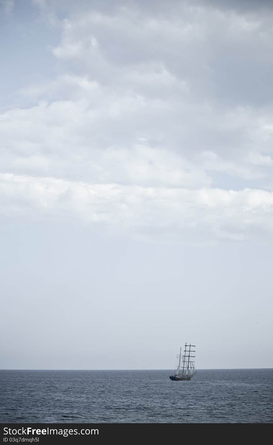 Image of vintage style. Old sailing ship in the sea .