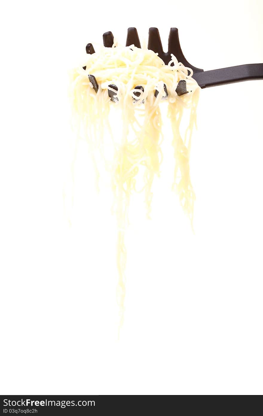 Noodles in green colander isolated on a white background. Noodles in green colander isolated on a white background