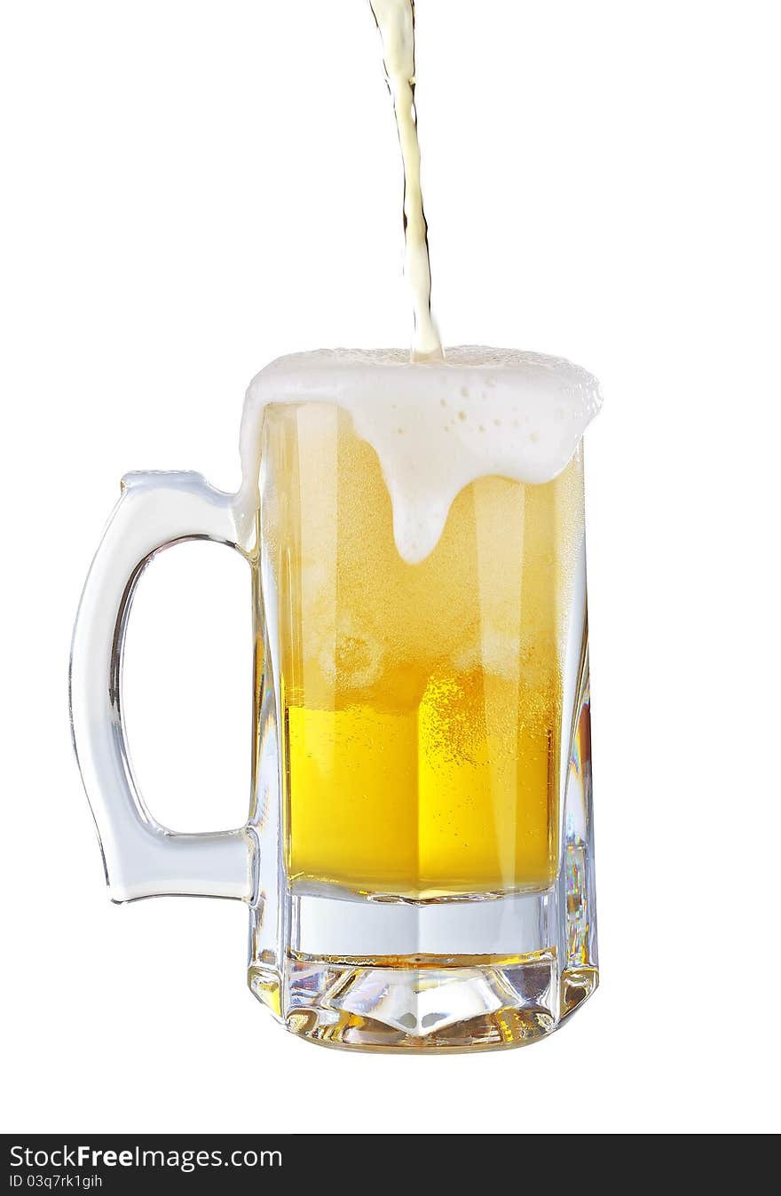 Beer being poured into a glass on a white background