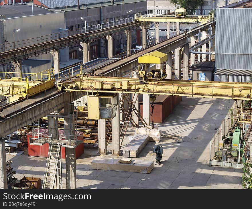 Industrially-warehouse zone of machine-building factory with the crane-beam. Industrially-warehouse zone of machine-building factory with the crane-beam.