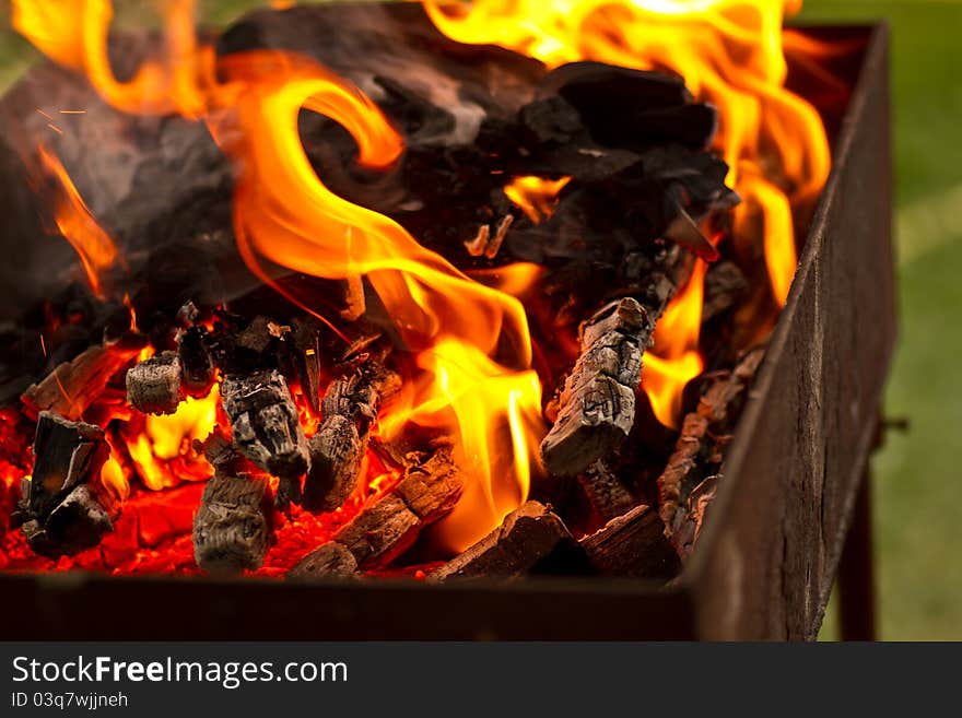 Wood burning in red flames of fire. Wood burning in red flames of fire