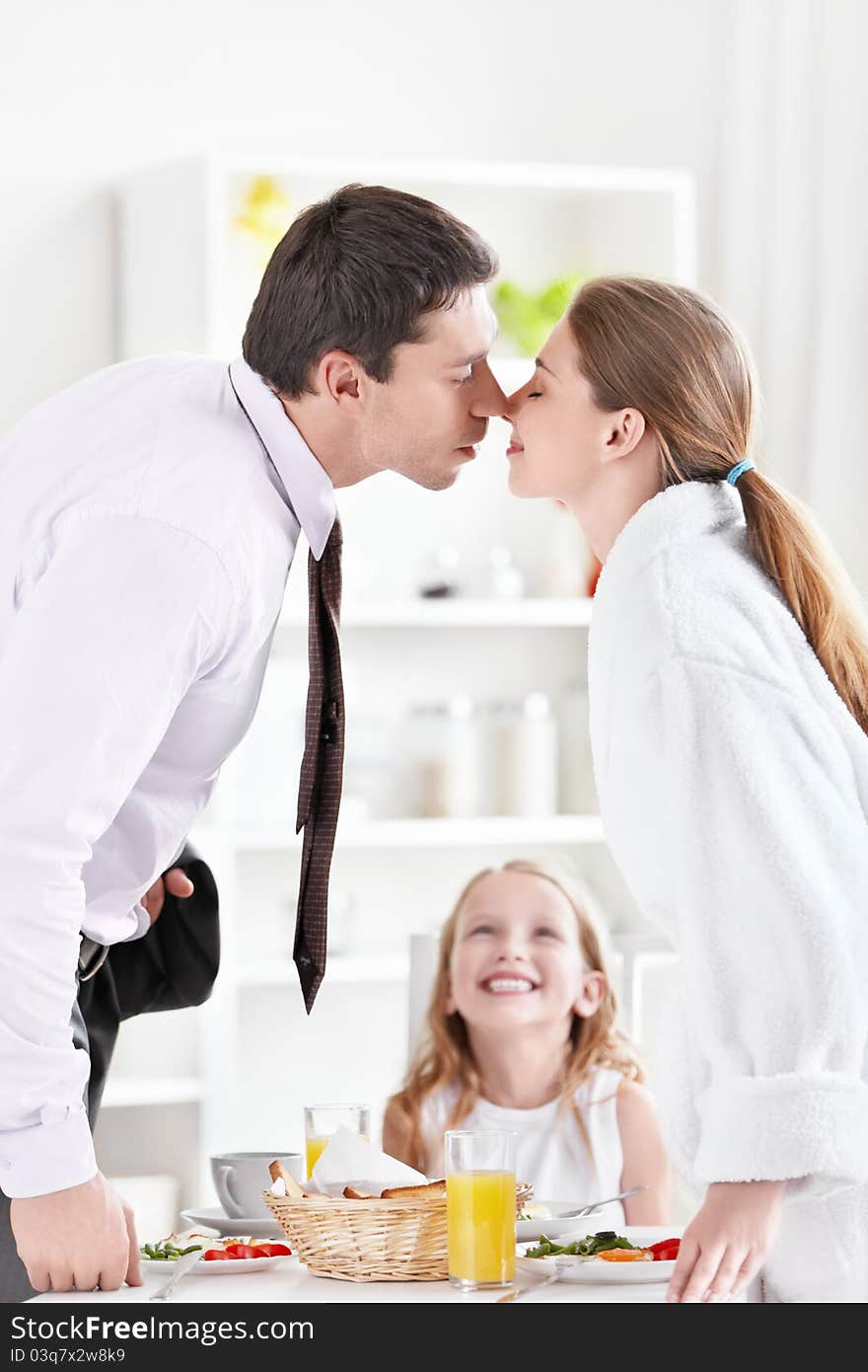 Kissing couple in the kitchen. Kissing couple in the kitchen