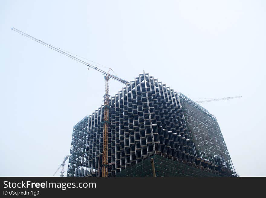 The photo of Building under construction .