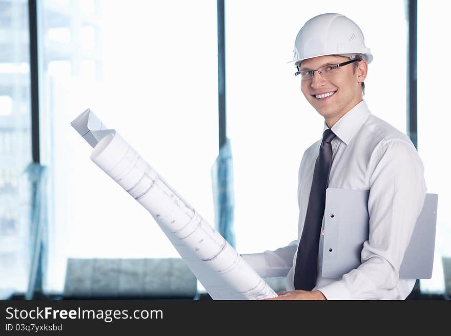 A young man with a project on building