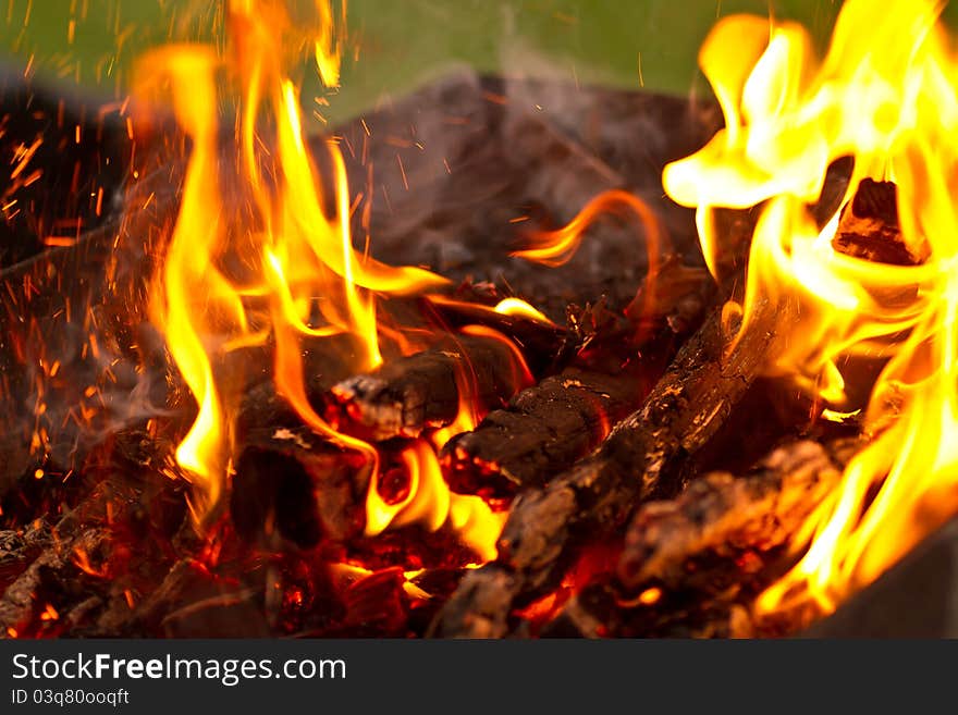 Wood burning in red flames of fire. Wood burning in red flames of fire