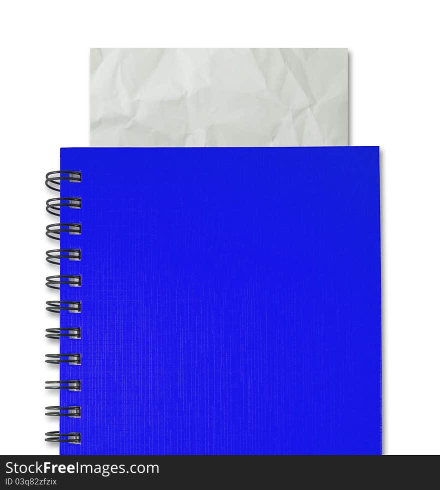 Crumpled paper in blue notebook