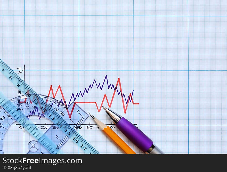 Rulers and pencil on graph paper with diagram. Rulers and pencil on graph paper with diagram