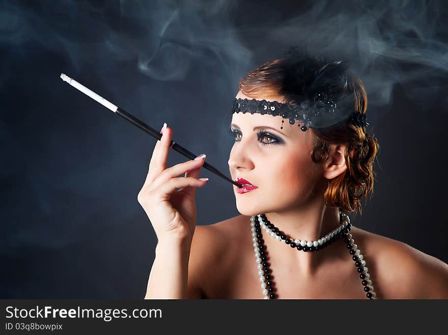 Smoking retro-styled sexy lady