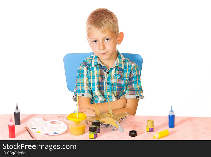 Boy paint airplane model