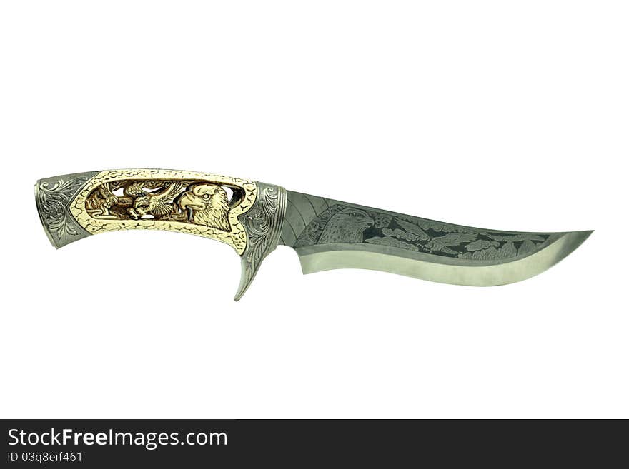 Exotic knife with eagle carvings isolated on white