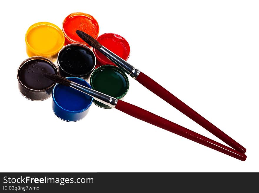 Colorful school water paints isolated over white background. Colorful school water paints isolated over white background.