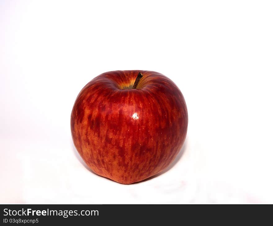 Fresh red apple isolated on a white background