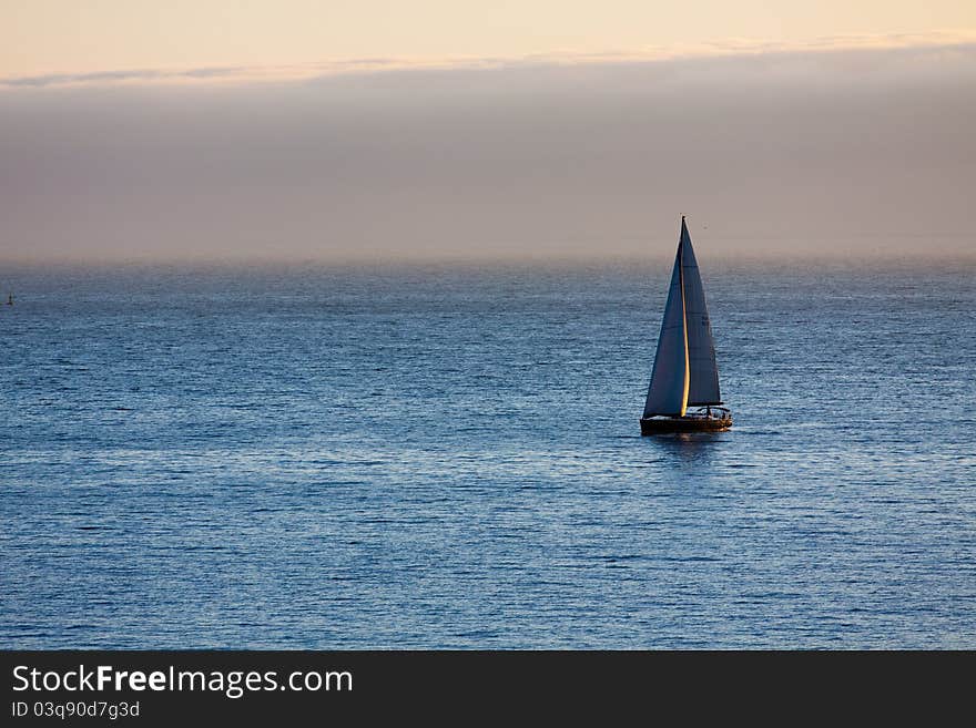 Boat In The Atlantic Ocean At The Evening