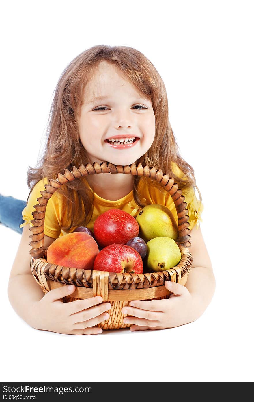 Girl holding a basket of fruit. Girl holding a basket of fruit