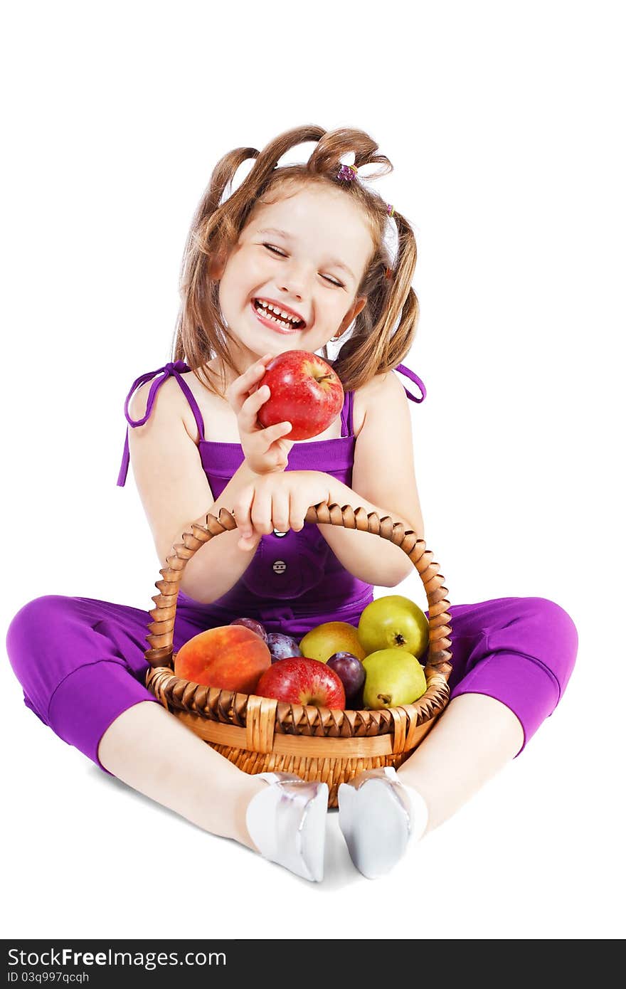 Girl holding a basket of fruit. Girl holding a basket of fruit