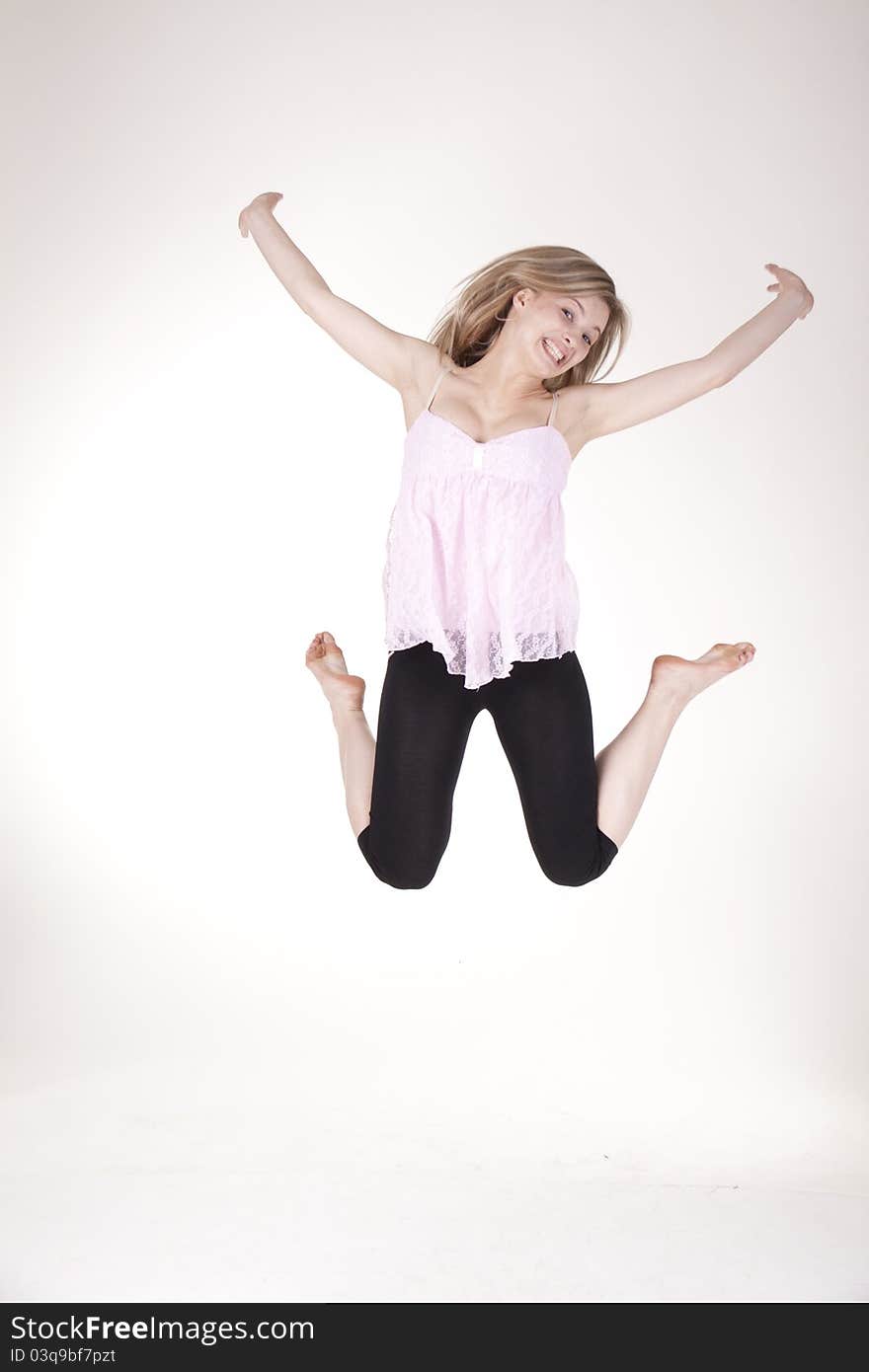 Jumping girl in the studio