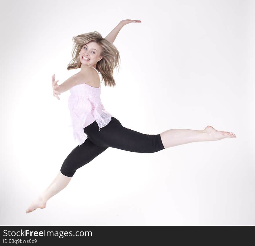 Jumping girl in the studio