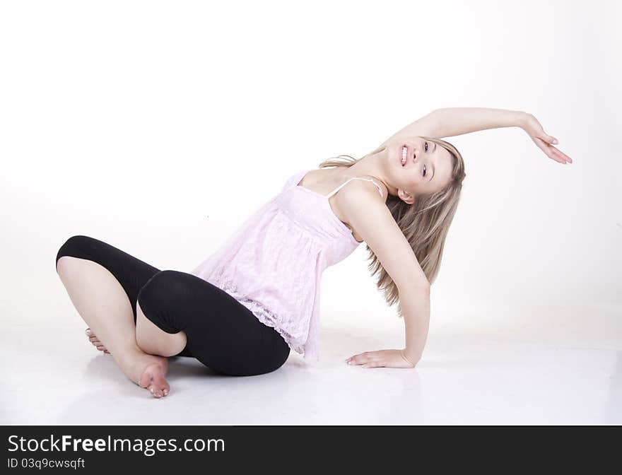 A girl sitting on the floor