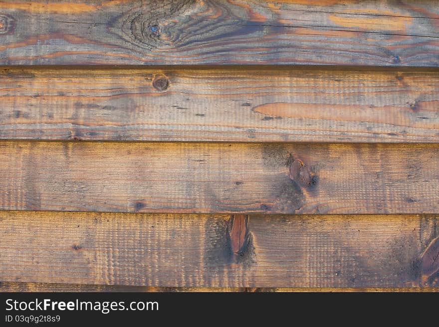 Horizontal wooden fence texture close up